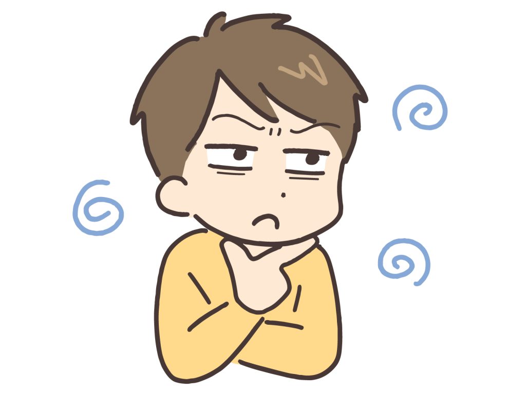 険しい顔で考え込む男性